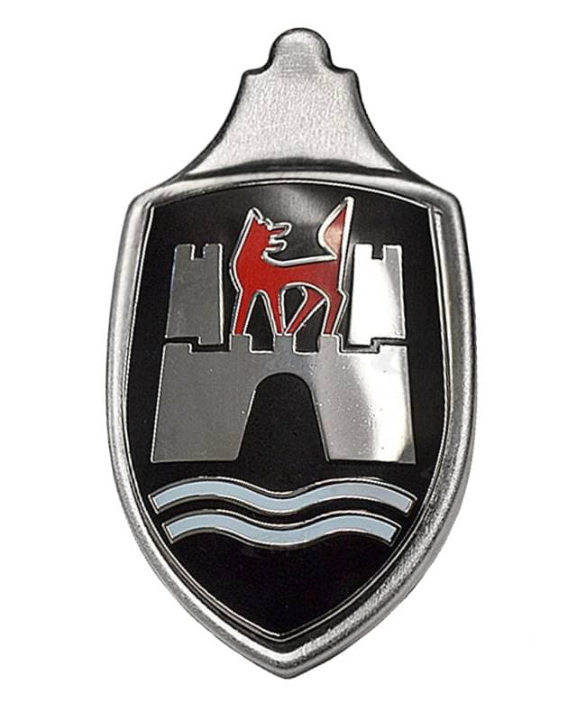 EMBLEM, FRONT HOOD WITH BASE AND BLACK BACKGROUND *GERMAN* BUG 1960-63 (1963 up to VIN # 5010447)